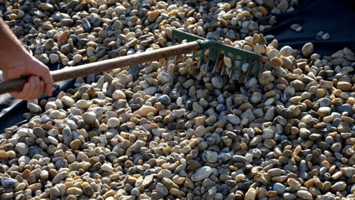 Spreading-Decorative-Rocks-in-Garden.jpg